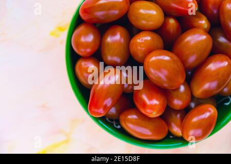 Fresh red cherry tomatoes on light background Stock Photo