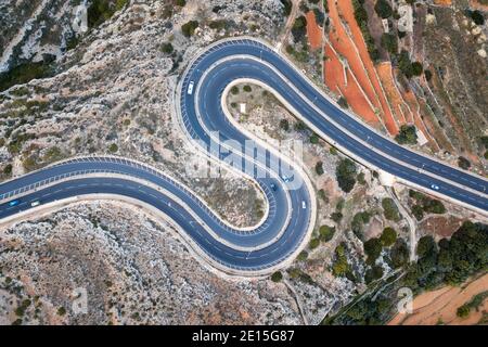 Bendy Mountain Road, taken in Malta in November 2020, post processed using exposure bracketing Stock Photo