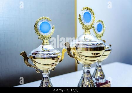 Three cup trophies, gold, silver and bronze Stock Photo