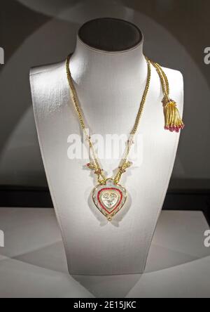 Taj Mahal heart pendant necklace photographed on a jewelry display bust with dramatic lighting Stock Photo