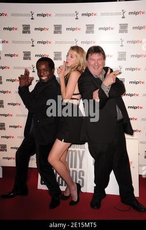 Richard Yearwood, Natalie Lisinska and Remy Girard attend a photocall