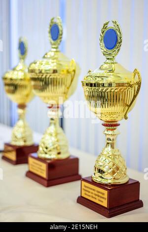 Three cup trophies, gold, silver and bronze Stock Photo