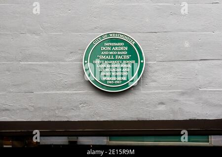 A green plaque in Carnaby Street commemorates the Mod band Small Faces & the impressario Don Arden. Stock Photo