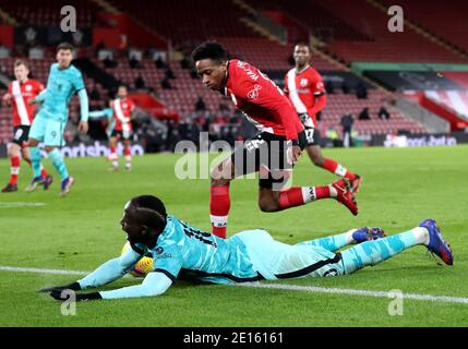 Liverpool's Sadio Mane goes down after being tackled by Southampton's Kyle Walker-Peters during the Premier League match at St Mary's Stadium, Southampton. Stock Photo