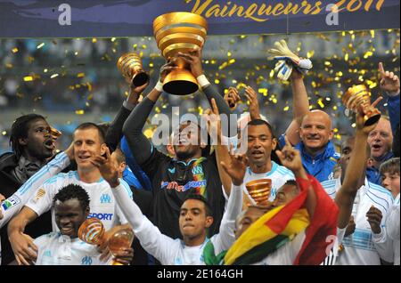 OM's captain and goalkeeper Steve Mandanda celebrates with his team mates after Marseille won the French Cup League Final soccer match against Montpellier HSC in Saint-Denis near Paris, France on April 23, 2011. Marseille won 1-0. Photo by Christian Liewig/ABACAPRESS.COM Stock Photo