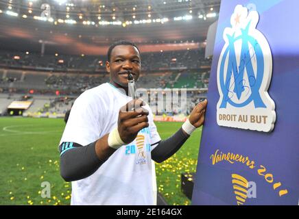 OM's goalkeeper Steve Mandanda celebrates after Marseille won the French Cup League Final soccer match against Montpellier HSC in Saint-Denis near Paris, France on April 23, 2011. Marseille won 1-0. Photo by Christian Liewig/ABACAPRESS.COM Stock Photo