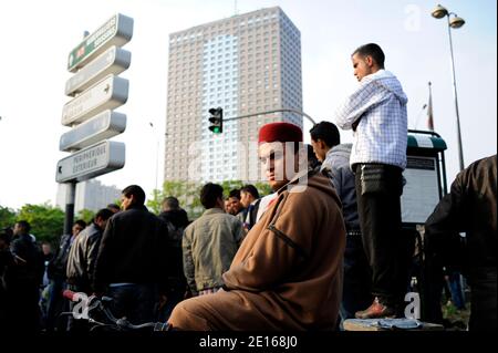 Hundreds of Tunisian refugees remain stranded in a park, Porte de la Villette in Paris, France, April 29, 2011. The 200 to 300 Tunisians who have been gathering in the park over the past few months fled their home country after former President Ben Ali left power on January 14, and arrived in France via the Italian island of Lampedusa, off the north African shore. Some have found accomodations, others are squatting. Over the past few weeks, French authorities have refused to let Tunisian migrants cross the border from Italy. The diplomatic rift between France and Italy deepened when France tem Stock Photo