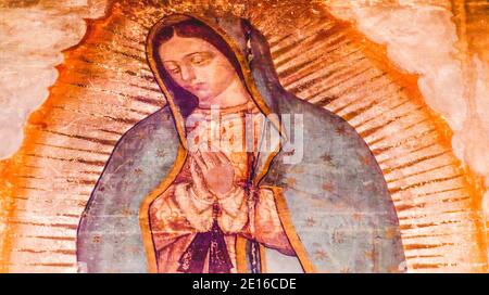 Original Virgin Mary Guadalupe Painting which was revealed by Indian Peasant Juan Diego in 1531 to Catholic Bishop. New Shrine of the Guadalupe, Mexic Stock Photo