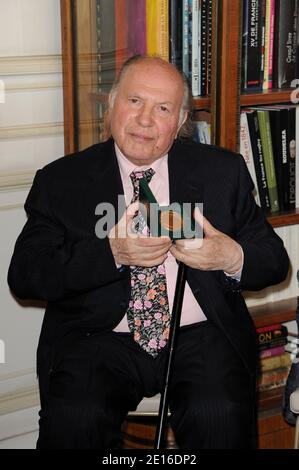File photo : Imre Kertesz receives the 'Medaille de Vermeil de la Ville de Paris' ( Paris city's vermeil medal) from Paris Mayor Bertrand Delanoe during a ceremony held at the Hotel de Ville in Paris, France on May 5, 2011. Kertesz, the Hungarian writer who won the 2002 Nobel Prize for Literature for fiction largely drawn from his very real experience as a teenage prisoner in Nazi concentration camps, died Thursday. He was 86. Photo by Nicolas Briquet/ABACAPRESS.COM Stock Photo