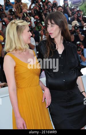 Kirsten Dunst (L) and Charlotte Gainsbourg at a photocall for the film 'Melancholia' directed by Lars von Trier presented in competition in the Feature Films section as part of the 64th Cannes International Film Festival, at the Palais des Festivals in Cannes, southern France on May 18, 2011. Photo by Hahn-Nebinger-Genin/ABACAPRESS.COM Stock Photo