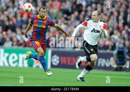 Barcelona's Javier Mascherano battles Manchester United's Wayne Rooney during the Champion's League Final soccer match, Barcelona vs Manchester United, in London, England on May 28th, 2011. Photo by Henri Szwarc/ABACAPRESS.COM arriving in the VIP Village of the Tennis French Open 2011 in Roland-Garros Stadium, Paris, France, on May 23th, 2011. Photo by Henri Szwarc/ABACAPRESS.COM Stock Photo