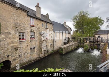 House with a watermill in Bayeaux, Normandy Stock Photo