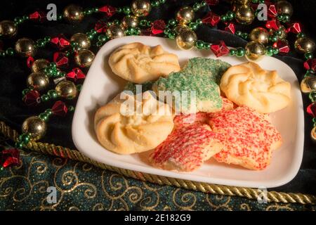 Cookies For Santa. Sugar and butter Christmas cookies with green and red sprinkles. Stock Photo
