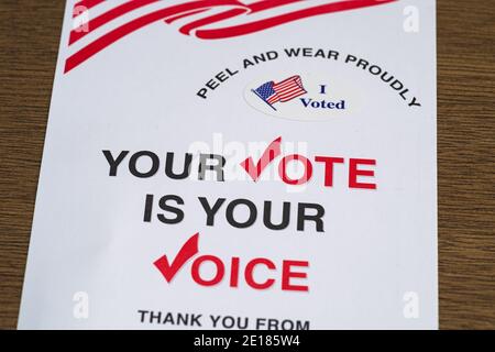 I voted vote by mail sticker page with your vote is your voice and US flags Stock Photo