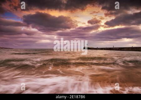 Dramatic sunset and sea at Les Sables d'Olonne in France Stock Photo