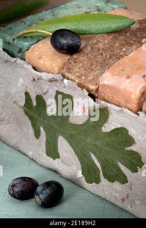 Davis, California, USA, 5 December 2020.  close-up on Pasture 42 organic olive soap packaged in recycled paper, on wooden background. Located in Guind Stock Photo