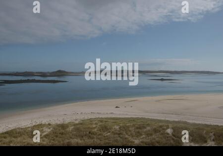 Panoramic View of the Landscape of Blockhouse Beach with Sea and Islands in the Background on the Island of Tresco in the Isles of Scilly, England, UK Stock Photo