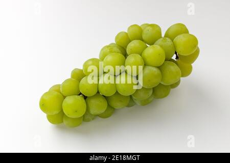Green grapes on white background Stock Photo