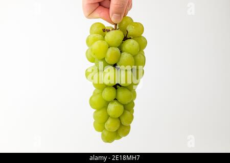 Green grapes on white background Stock Photo