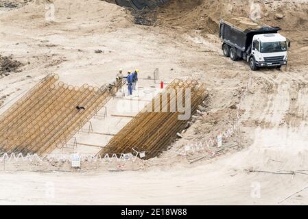 Construction workers working at construction site Stock Photo