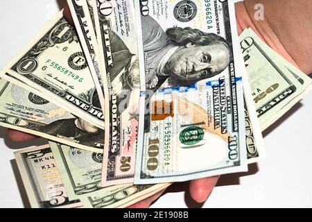 U.S. dollars in hand on a white background, american dollars Stock Photo