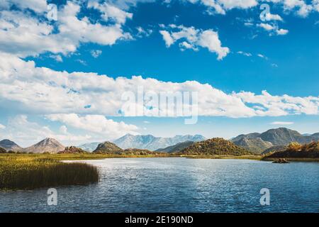 Lake in Montenegro against the backdrop of beautiful mountains in summer - beautiful nature in the reserve Stock Photo
