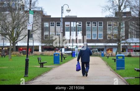 Crawley UK 5th January 2021 - Crawley Memorial Gardens in town centre is quiet today after the latest COVID-19 lockdown restrictions for England were announced yesterday by Prime Minister Boris Johnson . The West Sussex town of Crawley has one of the highest rise in cases in the South East and its economy is also suffering badly because of its proximity to Gatwick Airport : Credit Simon Dack / Alamy Live News Stock Photo