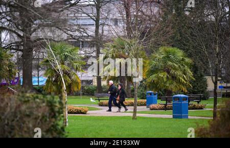 Crawley UK 5th January 2021 - Crawley Memorial Gardens in town centre is quiet today after the latest COVID-19 lockdown restrictions for England were announced yesterday by Prime Minister Boris Johnson . The West Sussex town of Crawley has one of the highest rise in cases in the South East and its economy is also suffering badly because of its proximity to Gatwick Airport : Credit Simon Dack / Alamy Live News Stock Photo