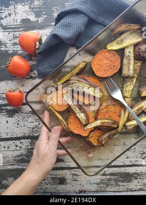 Baked vegetable in a wood table background Stock Photo