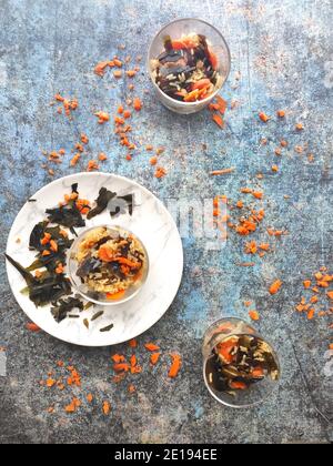 Seaweed and carrots rice in a blue background Stock Photo
