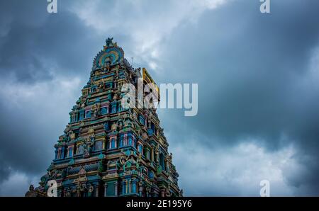 Beautiful view of the gopuram (tower) of Masani Amman Temple in Anaimalai, Pollachi, Coimbatore district of Tamil Nadu state, India. Stock Photo