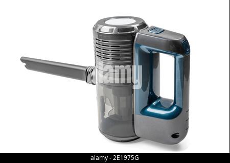 Small portable white and red vacuum cleaner isolated on white background. Modern hand-held white vacuum cleaner isolated on white background. Handheld Stock Photo