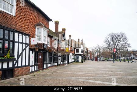 Crawley UK 5th January 2021 - Crawley High Street in the town centre is quiet today after the latest COVID-19 lockdown restrictions for England were announced yesterday by Prime Minister Boris Johnson . The West Sussex town of Crawley has one of the highest rise in cases in the South East and its economy is also suffering badly because of its proximity to Gatwick Airport : Credit Simon Dack / Alamy Live News Stock Photo