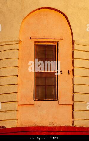 high elongated window on a semicircular facade Stock Photo