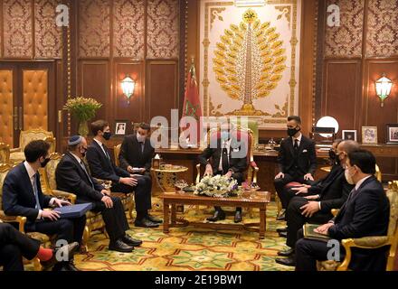 King Mohammed VI of Morocco (center) and his son Crown Prince Hassan (4th from R) receives US President special advisor Jared Kushner (3rd from L) and Israeli head of National Security Meir Ben Shabbat (2nd from L) at the Royal Palace in Rabat, Morocco, on December 22, 2020. Photo by GPO/Balkis Press/ABACAPRESS.COM Stock Photo