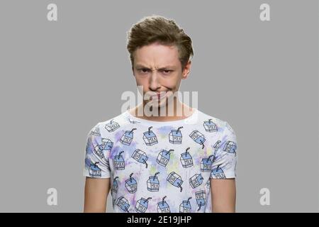 Teen boy making silly grimace. Stock Photo