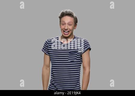 Portrait of expressive caucasian teen boy. Stock Photo