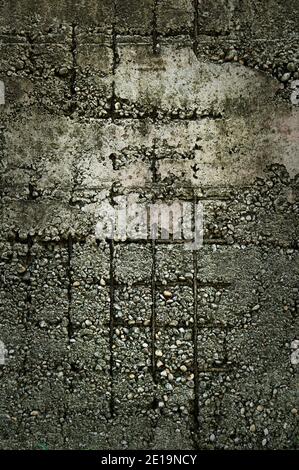 Aged concrete wall texture with iron grid. Old textured cement grunge wall surface background pattern with cracks and scratches. Stock Photo