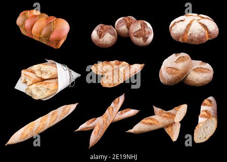 Assortment of different types of bread, loaf, baguettes, made of wheat, rye organic, isolated on black background. Healthy eating and traditional bake Stock Photo