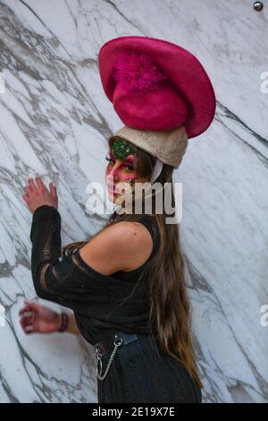 Flamboyant fashion designer Pierre Garroudi held his flashmob in London taking place from Knightsbridge to Sloan Square in December. Pierre showcases his designs and crisscrosses central London with a different location and designs each week. Merging art with fashion his designs have been worn by some of the famous style icons from Naomi Campbell to Scarlet Johansson. Strking makeup is used from the makeup artists @makeup and beauty jo @hair makeup by jacy and @zee makeup hair @imperialartistryunlimited Models used were @ ericabishop @erinlxoxo @elina.popescu @siborafisniku1 @merilintoomra Stock Photo