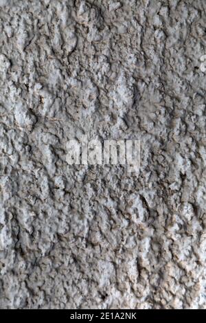 Covering a wall with cement ortar by throwing it. Close-up. This image may be used as a background. Stock Photo