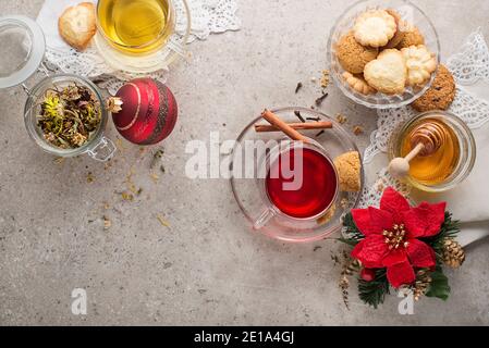 Winter drinks with mulled red wine and herbal tea. Traditional hot drinks at winter holidays time Stock Photo
