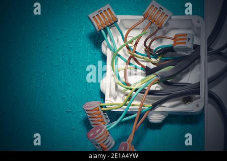electrical wires in the box. wires without insulation. security. Stock Photo