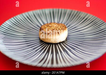 a single traditional Spanish Christmas sweet called a Mantecado landscape Stock Photo