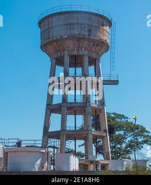 A very hight concrete made large capacity water storage container tank Stock Photo