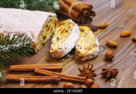 christmas stollen on wooden background. selective focus.holoday Stock Photo