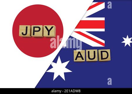 Japan and Australia currencies codes on national flags background. International money transfer concept Stock Photo