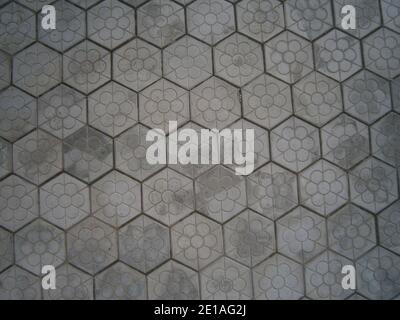 The background is the texture of the tile. The pattern and texture of the tile is construction. Stock Photo