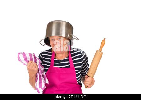 Funny elder woman with pan on the head isolated over white background Stock Photo