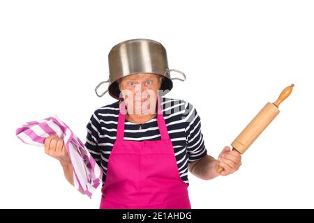 Funny elder woman with pan on the head isolated over white background Stock Photo